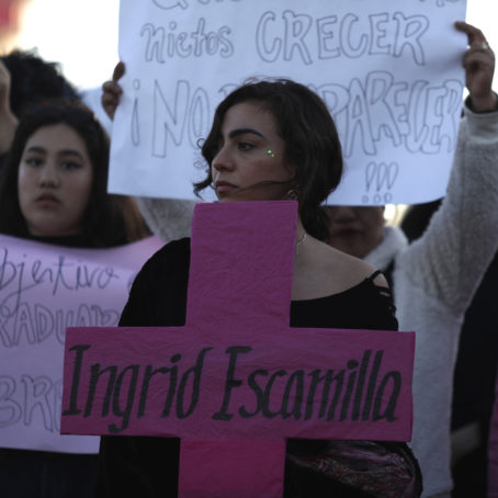 Women holding demonstration banners