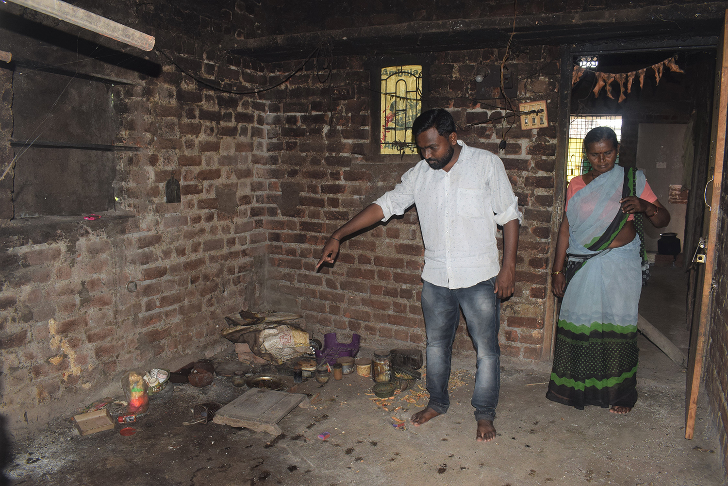 A photo of a man and a woman in a room