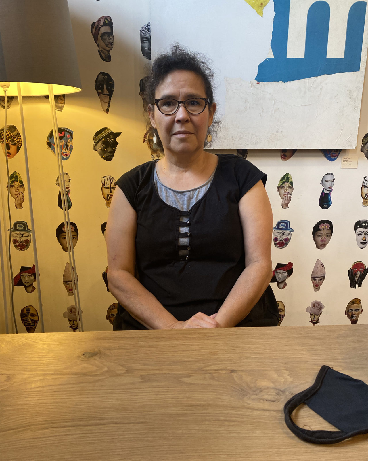 Photo of a woman seated at a table