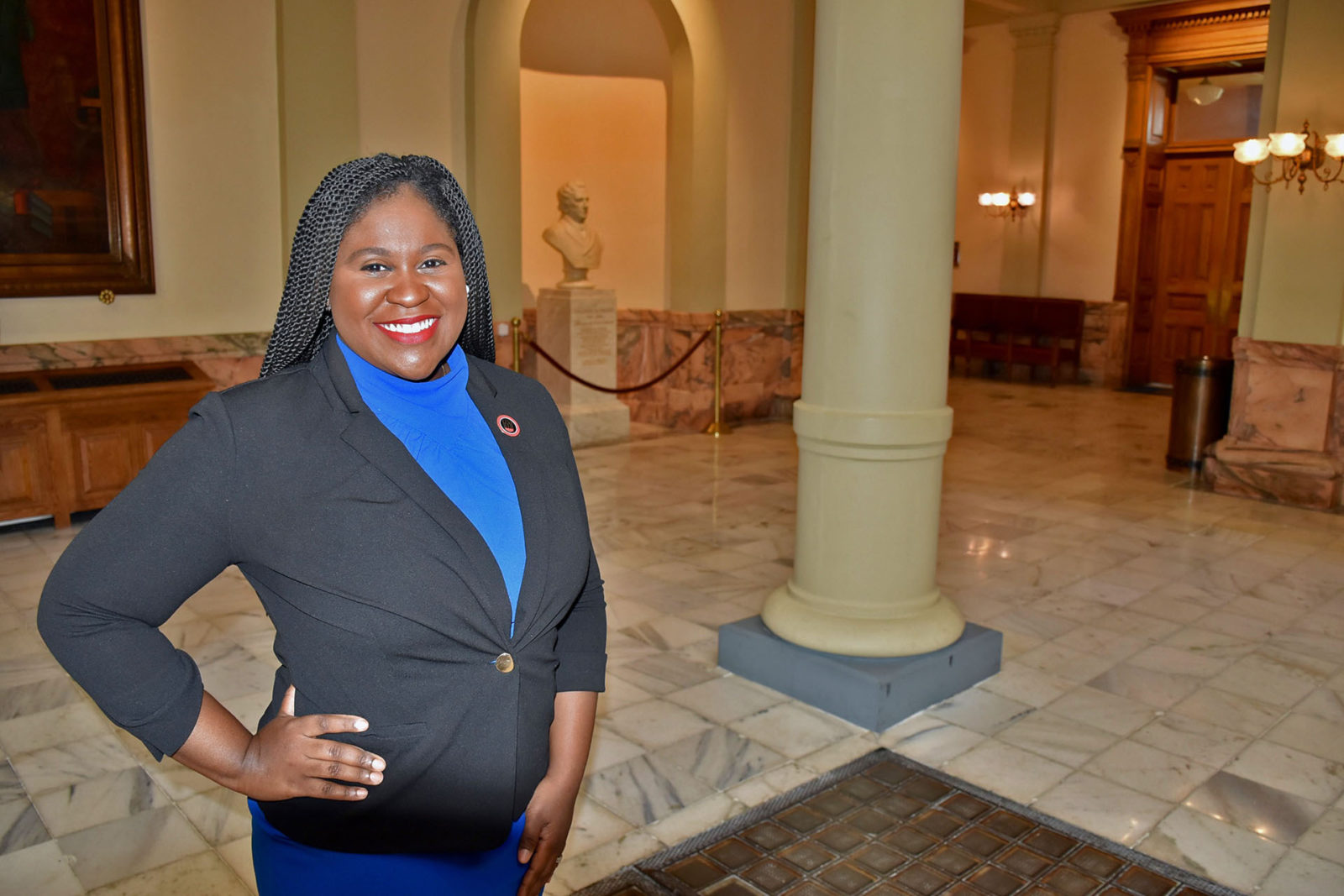 A photo of a woman posing for a picture