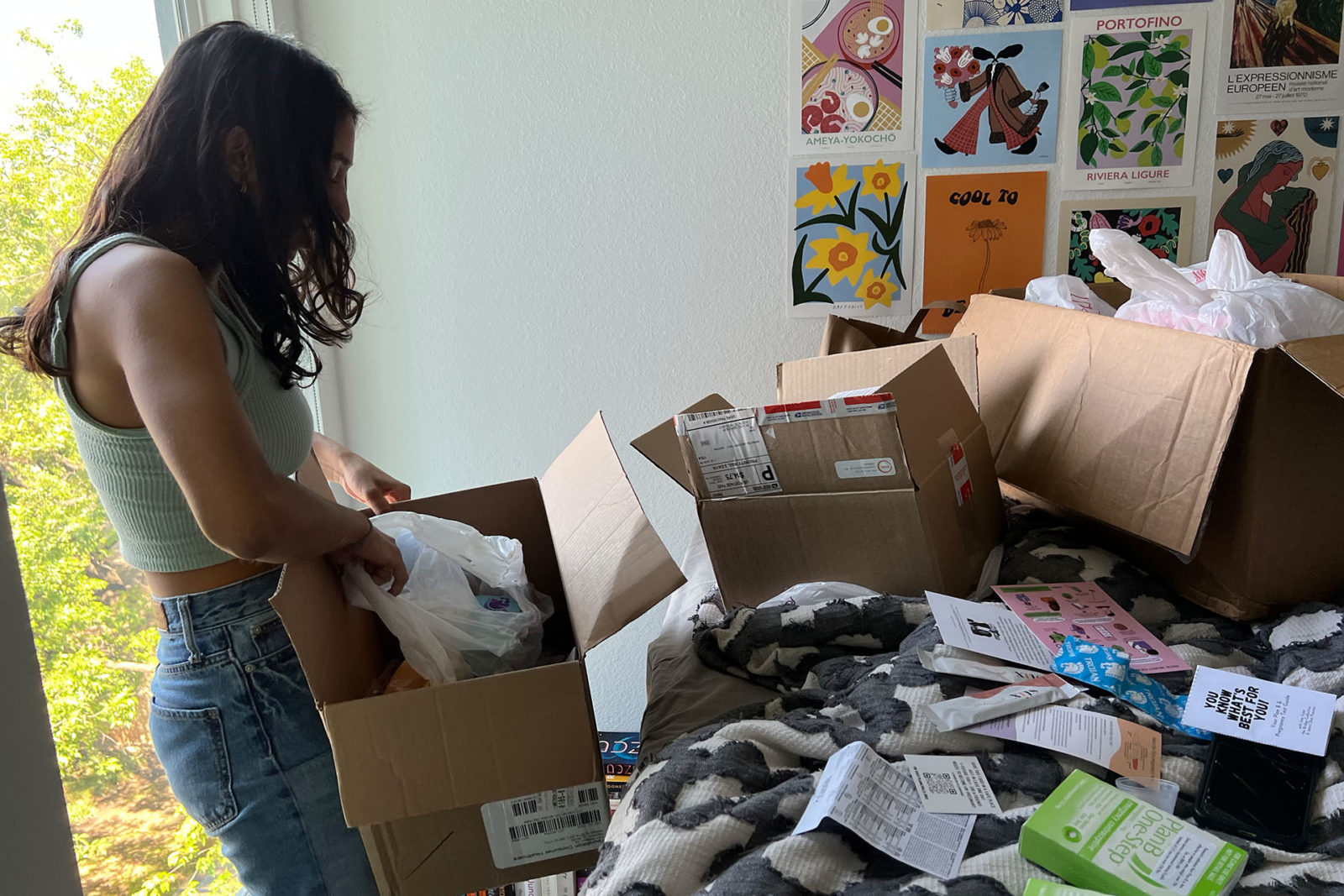 A photo of a person digging in a box