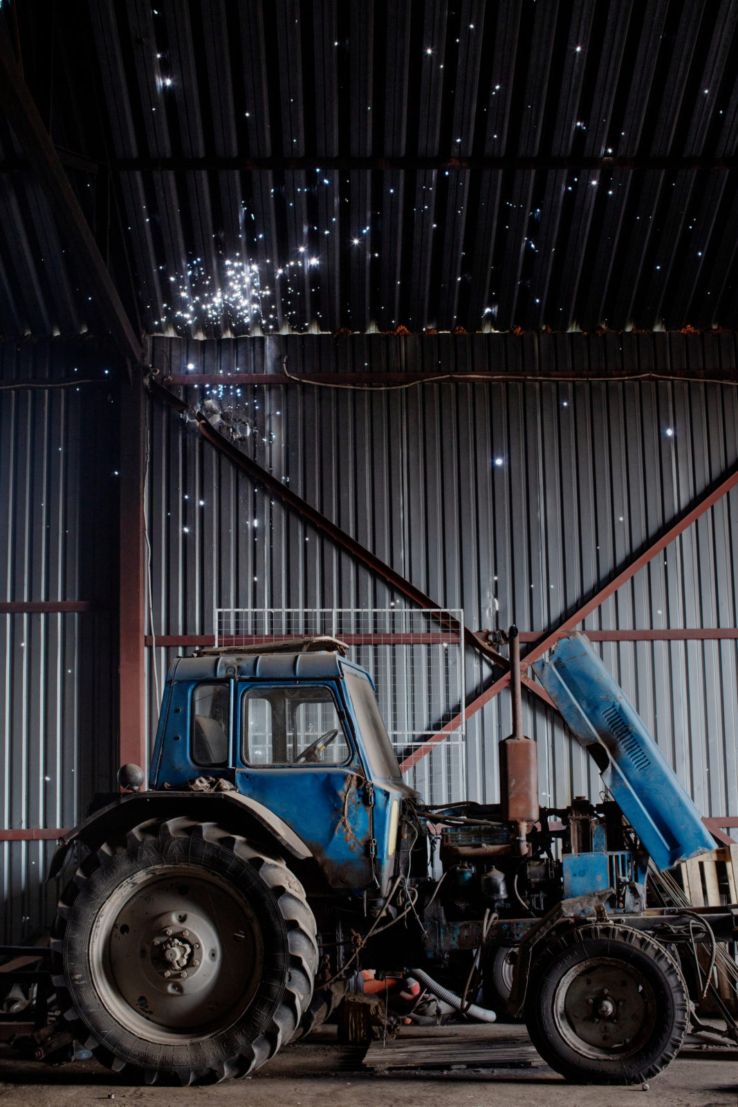 Farm equipment inside a structure