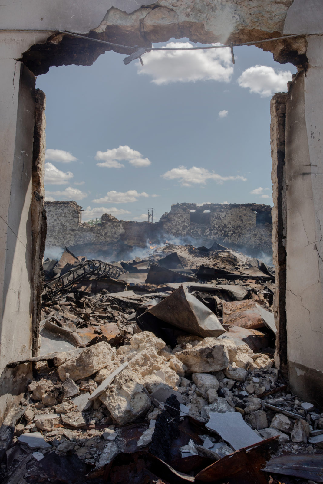 burning rubble from a bombed out building