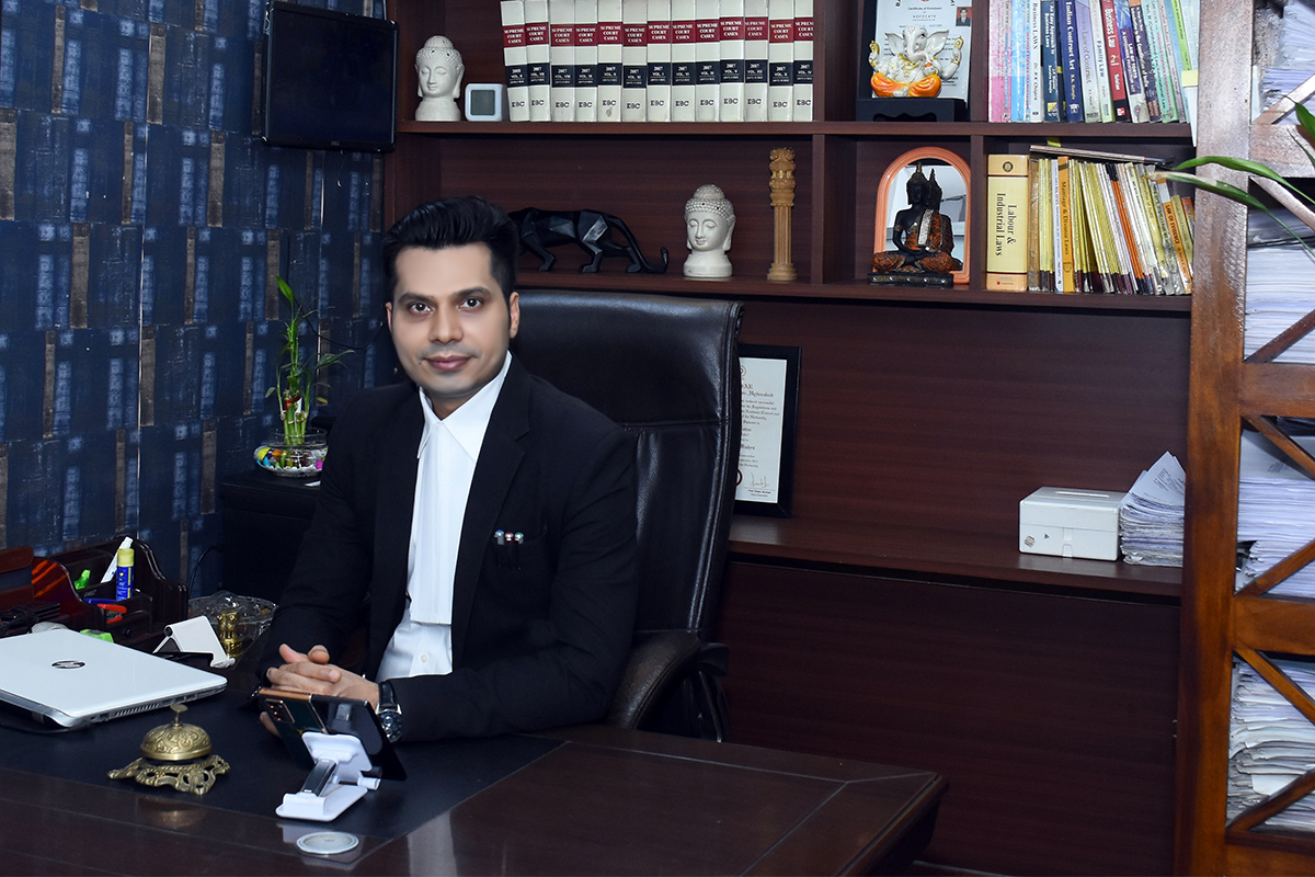A man sits at his desk at the Supreme Court of India